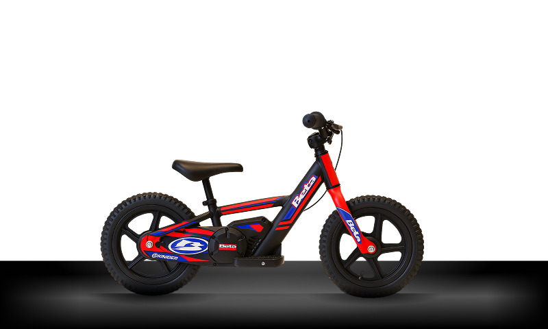 Beta Motos Tigre Argentina - Moto eléctrica e-Kinder en vista lateral, diseño infantil rojo y azul.