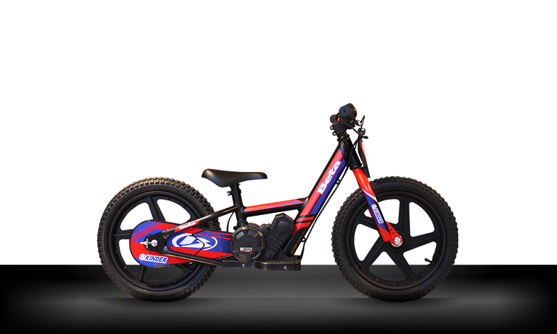 Beta Motos Tigre Argentina - Moto eléctrica e-Kinder Big Wheel en vista lateral, diseño infantil rojo y azul con ruedas grandes.
